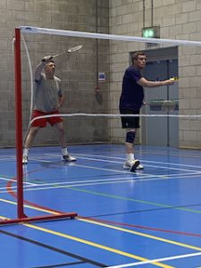 John and Dave playing badminton